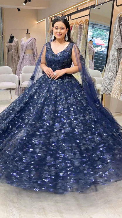 Sequins & tube work on net midnight blue engagement gown with falling sleeves