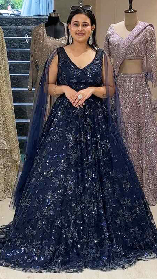 Sequins & tube work on net midnight blue engagement gown with falling sleeves