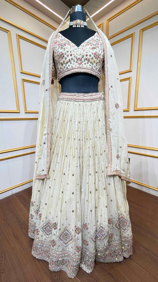 Golden beige lehenga with pearl & zari work on chinon