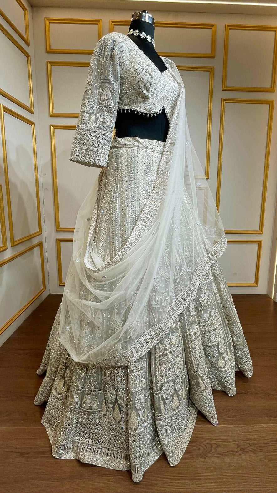 Resham & zarkan work on white smoke lehenga with heavy dupatta