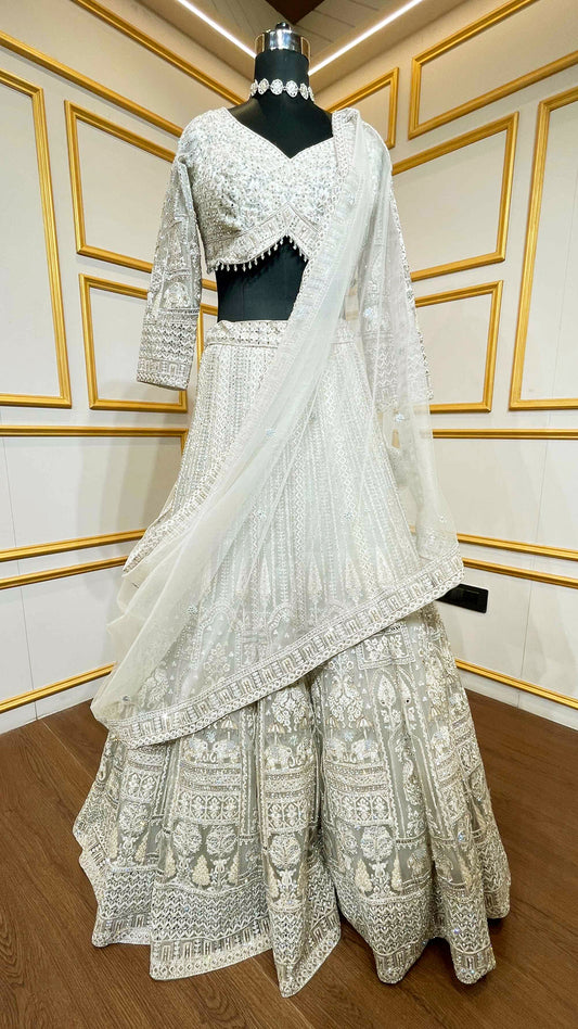 Resham & zarkan work on white smoke lehenga with heavy dupatta