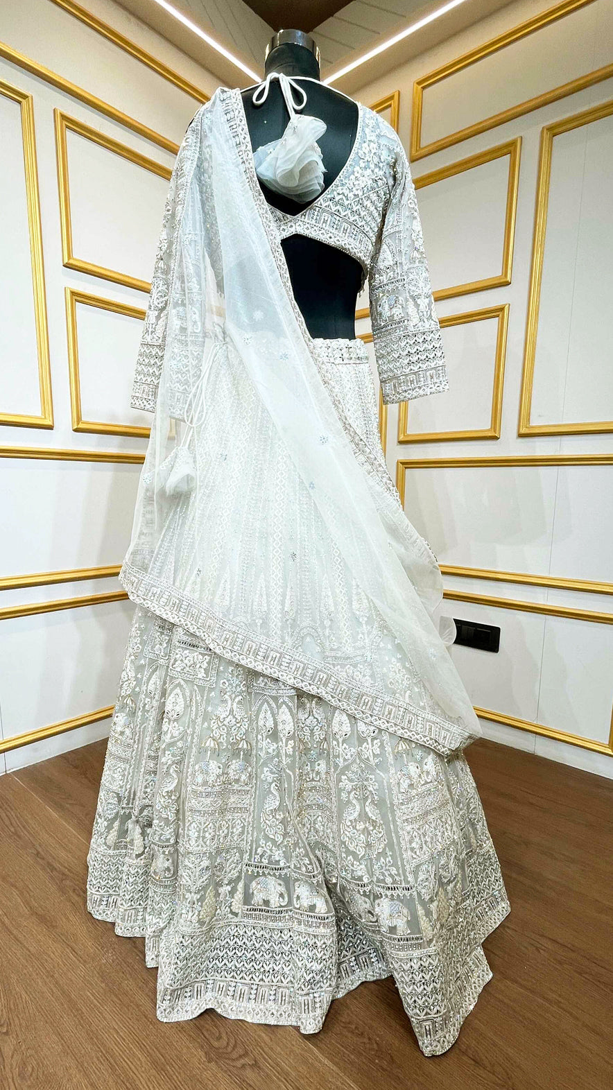 Resham & zarkan work on white smoke lehenga with heavy dupatta
