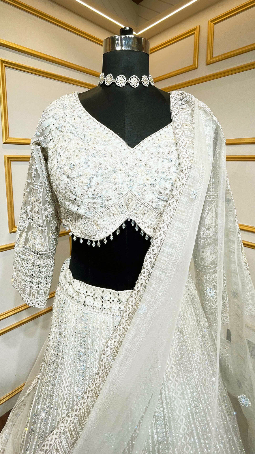 Resham & zarkan work on white smoke lehenga with heavy dupatta