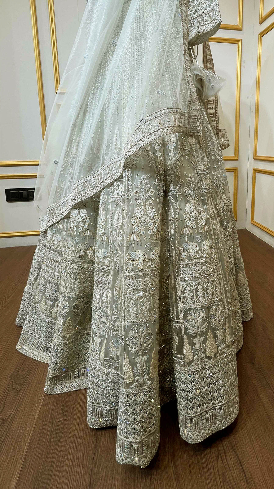Resham & zarkan work on white smoke lehenga with heavy dupatta