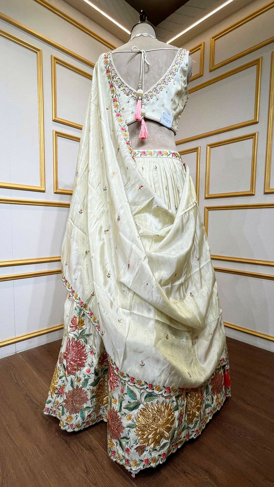 Crushed tissue lehenga with dabka & pearl work on choli in ivory gold