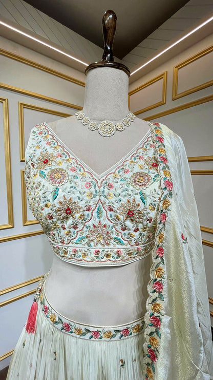 Crushed tissue lehenga with dabka & pearl work on choli in ivory gold