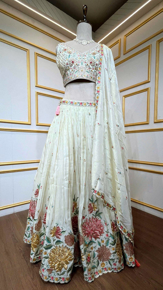 Crushed tissue lehenga with dabka & pearl work on choli in ivory gold