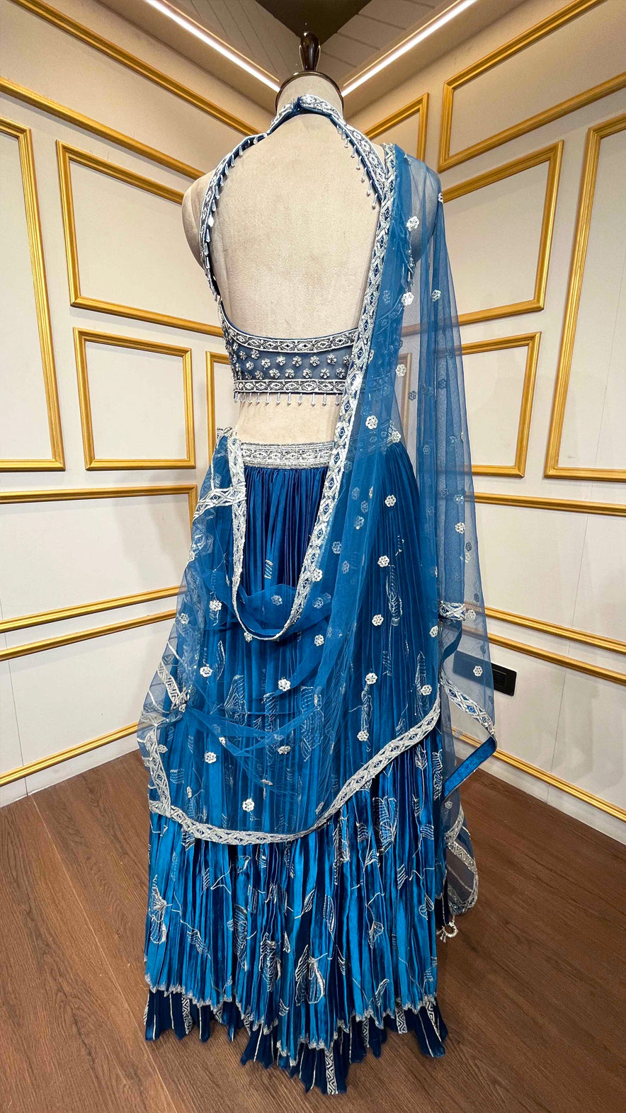 Peacock blue organza lehenga choli with pearl & sequins