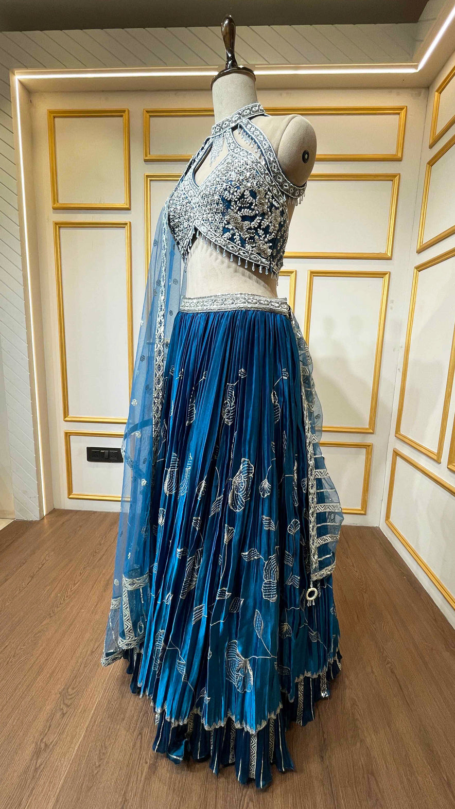 Peacock blue organza lehenga choli with pearl & sequins