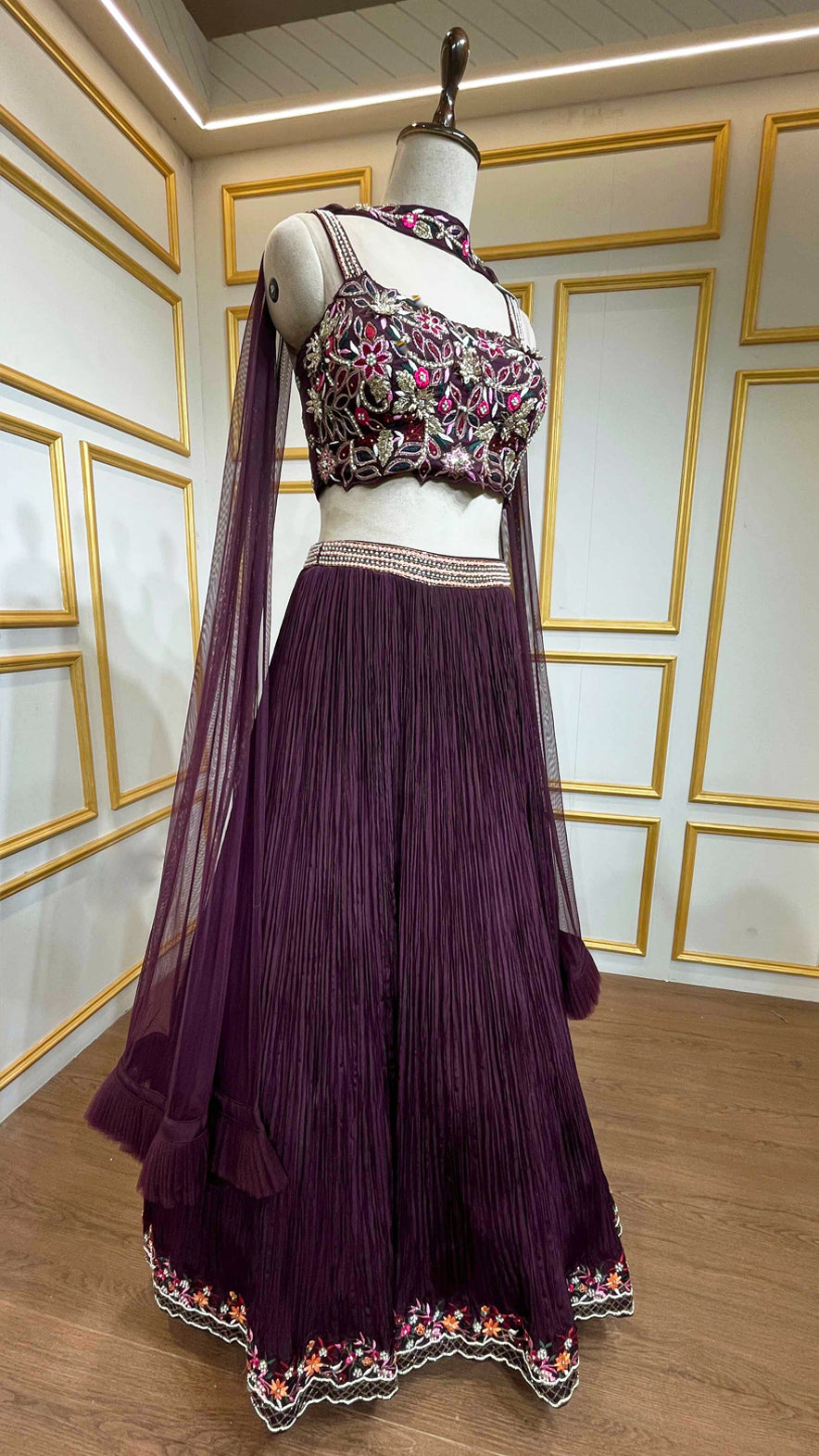 Wine lehenga with resham & cut dana work on choli in crushed georgette