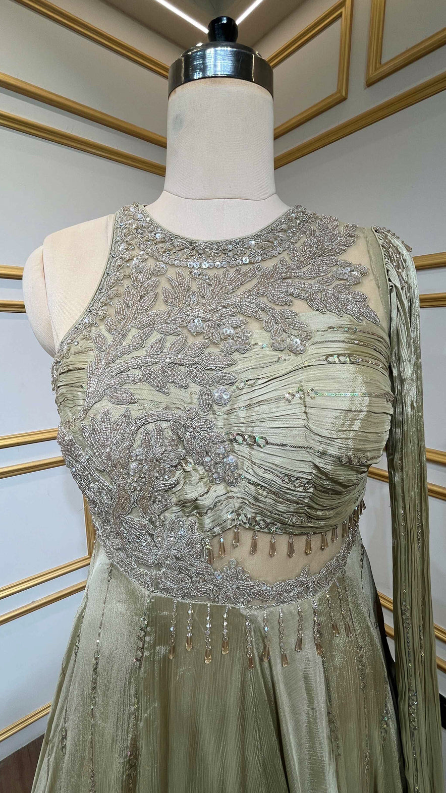Brushed gold tissue gown with pearl & sequins work