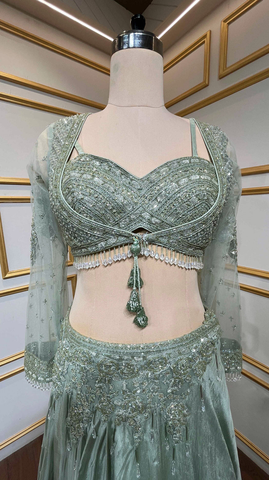 Chinon pista green croptop lehenga with cut dana & sequins