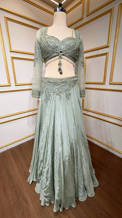 Chinon pista green croptop lehenga with cut dana & sequins