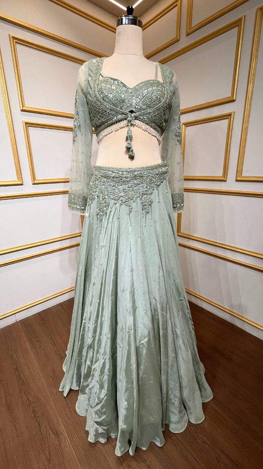 Chinon pista green croptop lehenga with cut dana & sequins