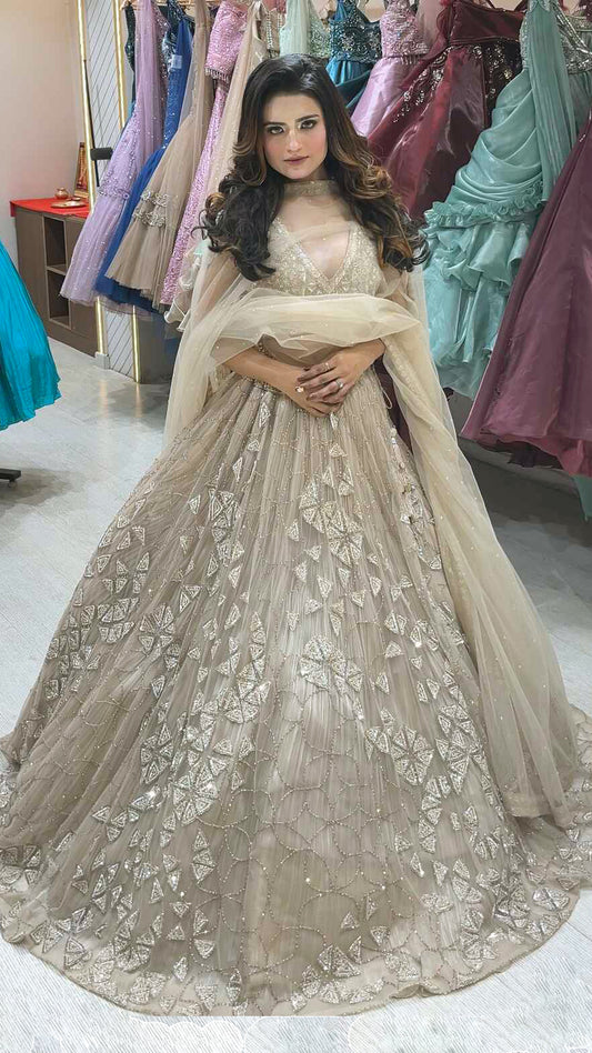 Ivory gold engagement lehenga with zarkan & cut dana work & heavy dupatta