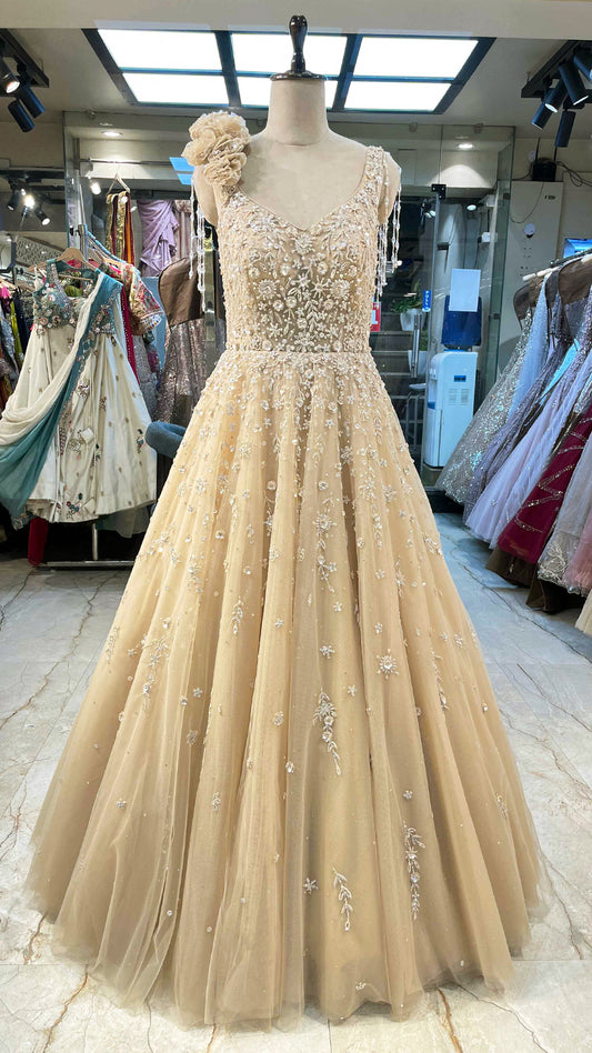 Golden cream net gown with sequins & zarkan work