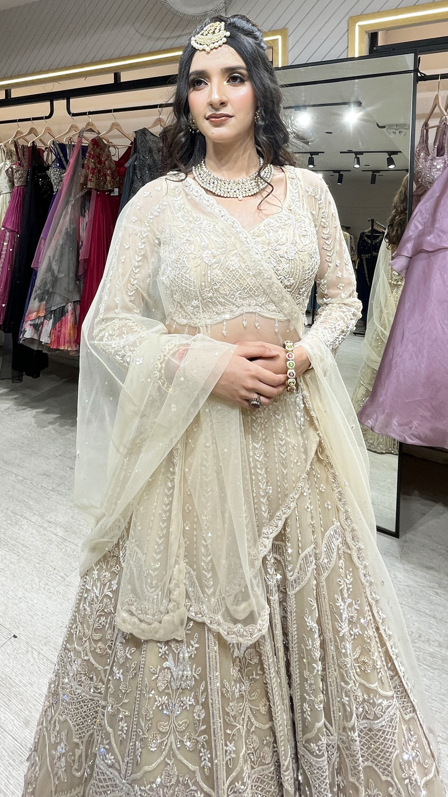 Tube & pearl work on net ivory cream lehenga along with four side border dupatta