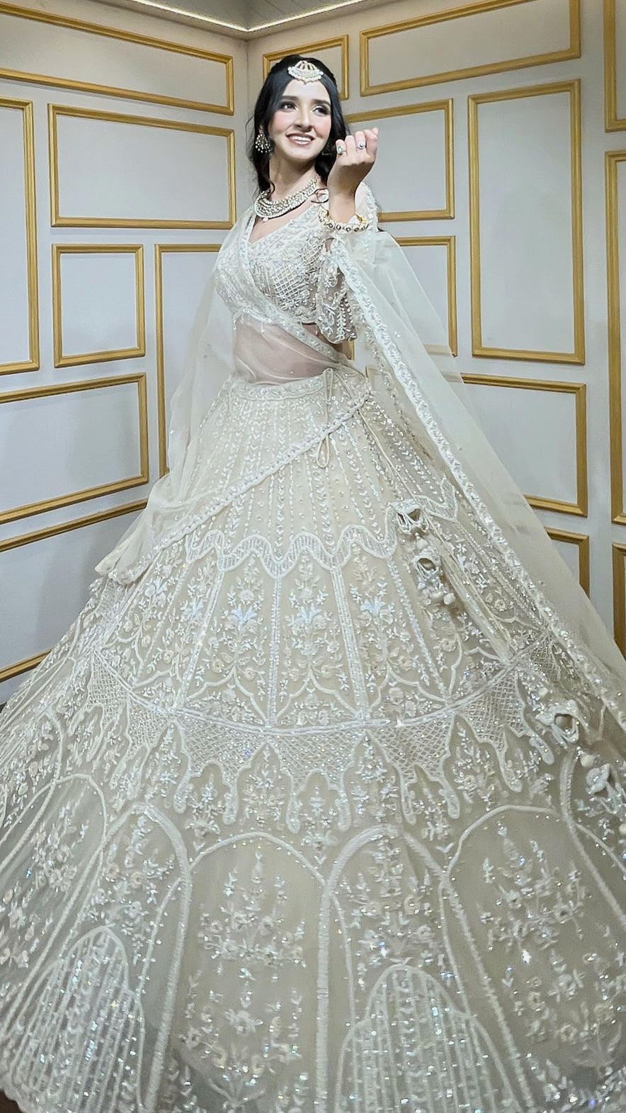 Tube & pearl work on net ivory cream lehenga along with four side border dupatta