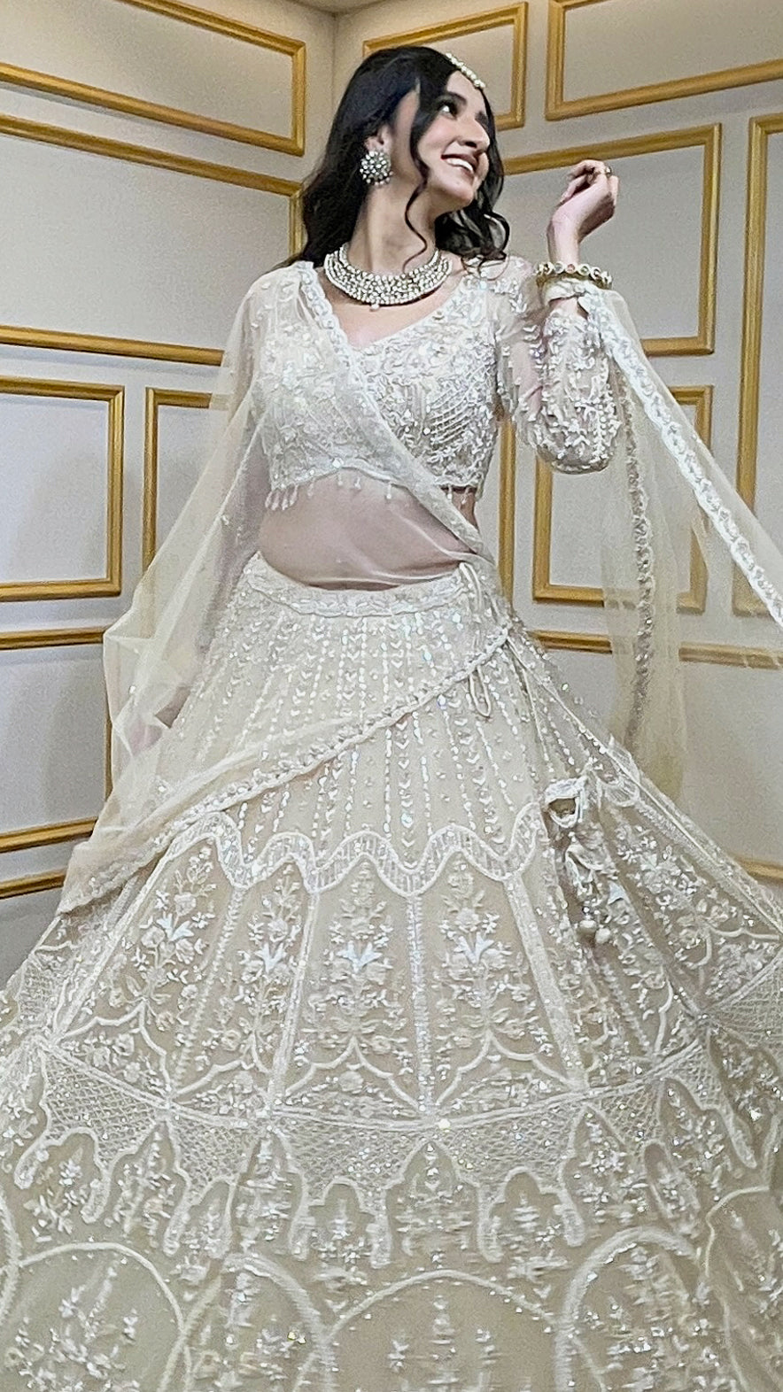 Tube & pearl work on net ivory cream lehenga along with four side border dupatta