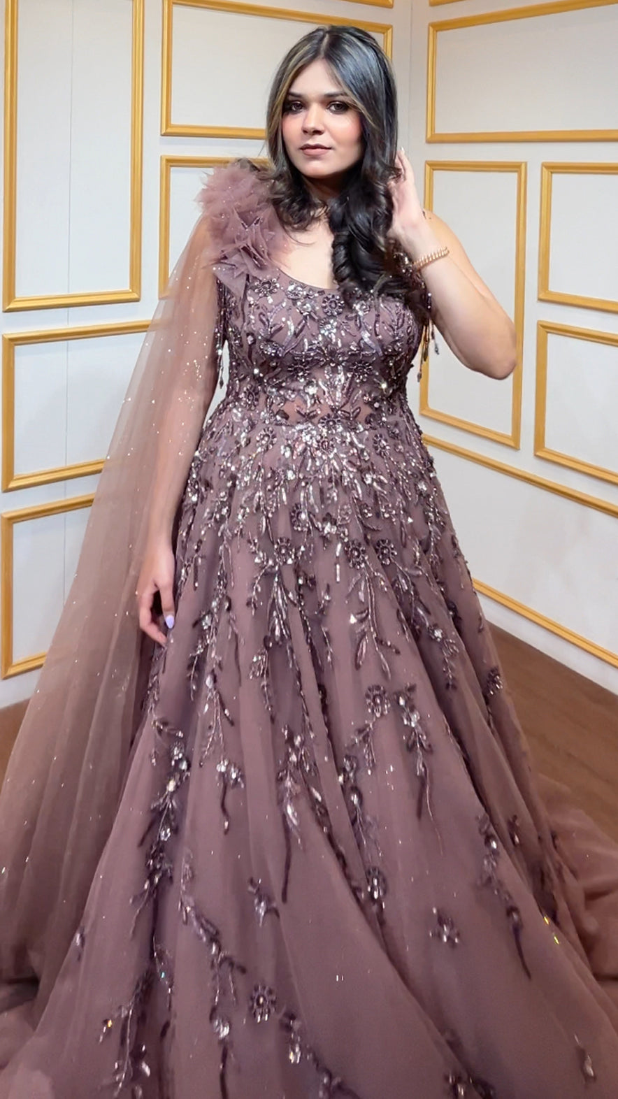 Sequins & crystal work on copper brown net engagement gown