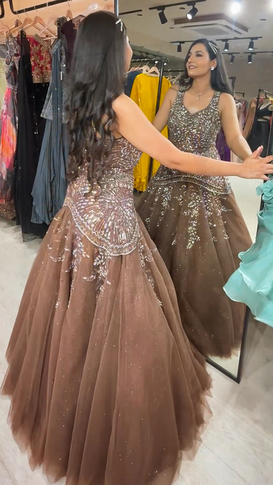 Net engagement gown with zarkan & sequins work in chocolate brown