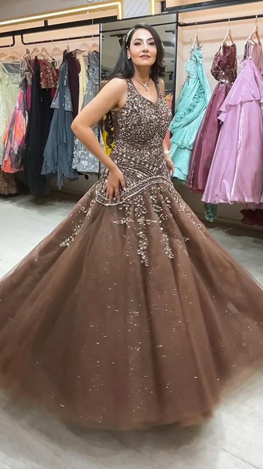 Net engagement gown with zarkan & sequins work in chocolate brown