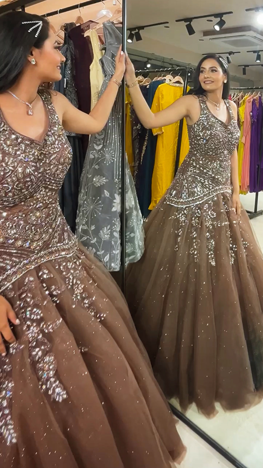 Net engagement gown with zarkan & sequins work in chocolate brown
