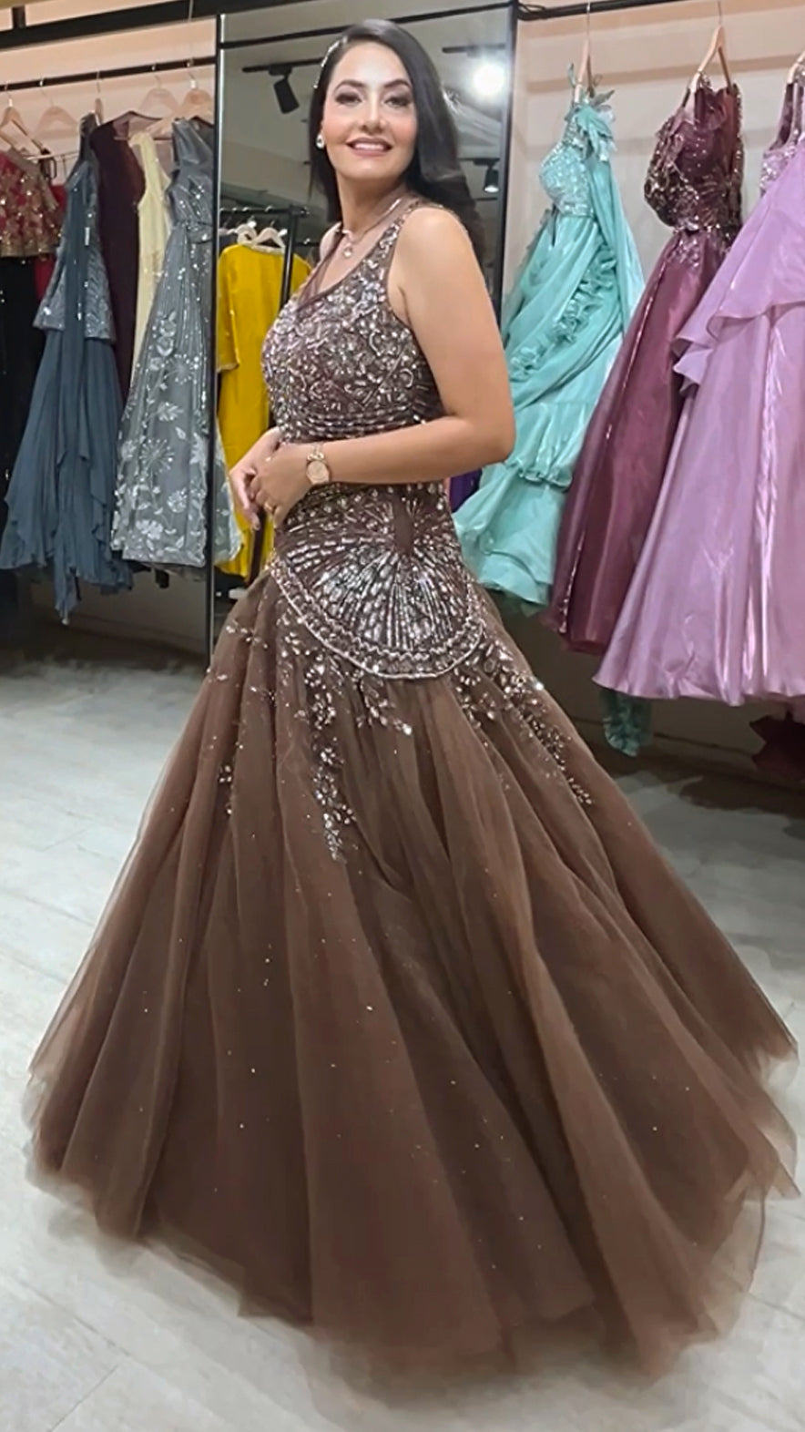 Net engagement gown with zarkan & sequins work in chocolate brown