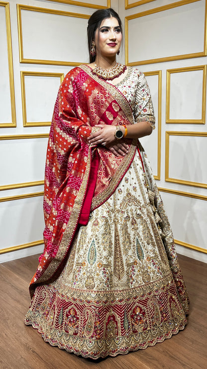 Zari & zarkan work on rawsilk lehenga with bandhej dupatta