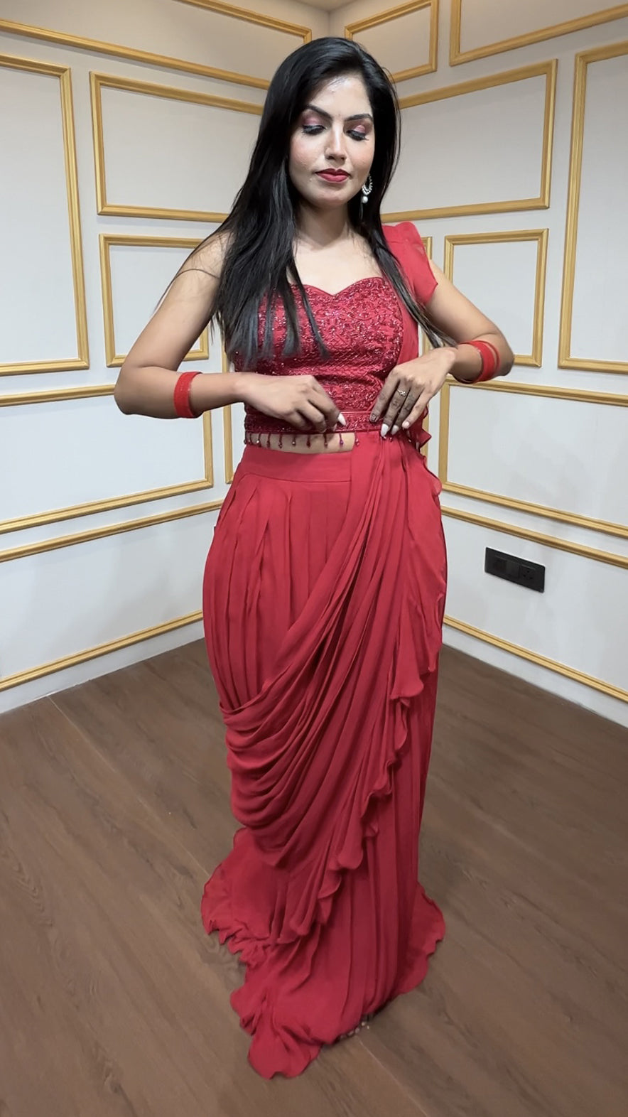 Georgette pre draped saree in rose red with cut dana & crystal