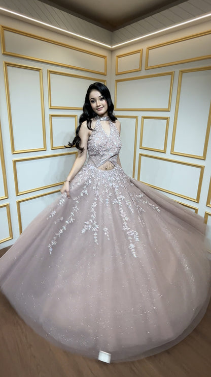 Rose gold engagement gown with cut dana & crystal in net along with peephole detailing