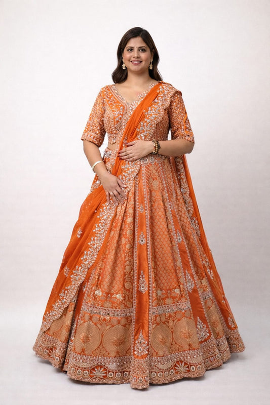 Rust brocket lehenga with zari & crystal work and heavy dupatta