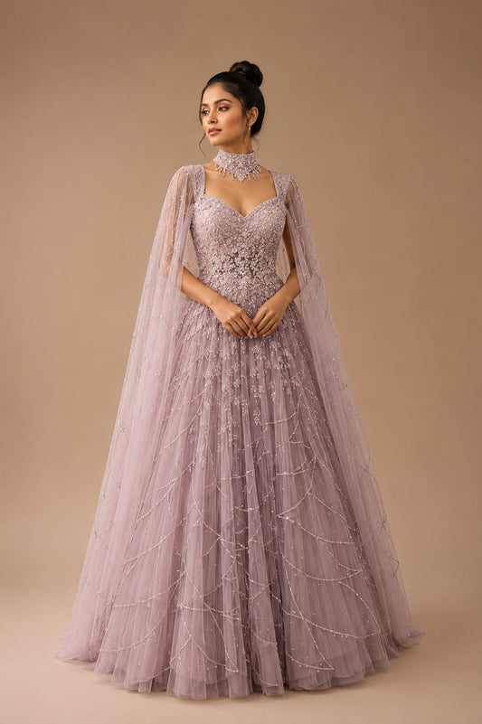 Baby pink engagement gown on net with zarkan & pearl work all over, embellished chokar and falling sleeves