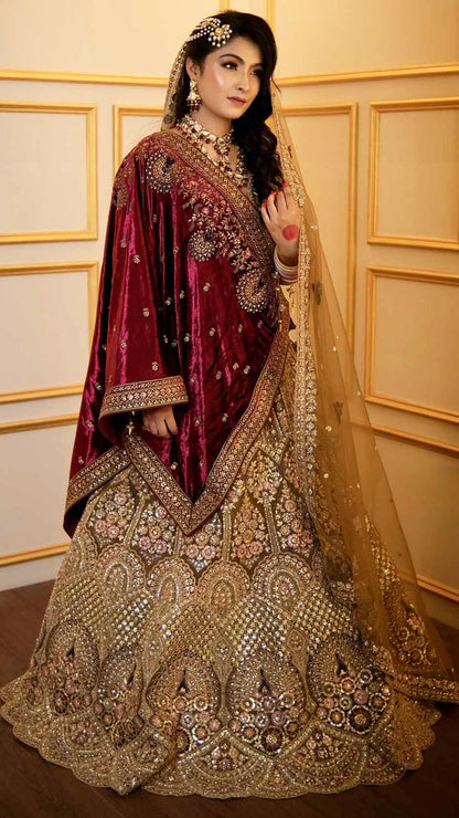 Zari & multicolor thread work on net bridal lehenga in tan with heavy dupattaZari & multicolor thread work on net bridal lehenga in tan with heavy dupatta