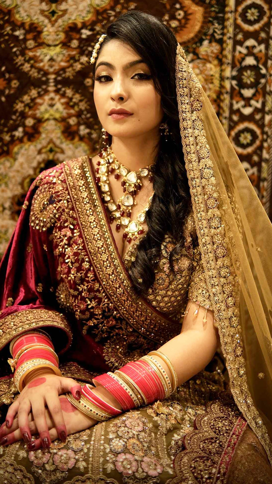 Zari & multicolor thread work on net bridal lehenga in tan with heavy dupattaZari & multicolor thread work on net bridal lehenga in tan with heavy dupatta
