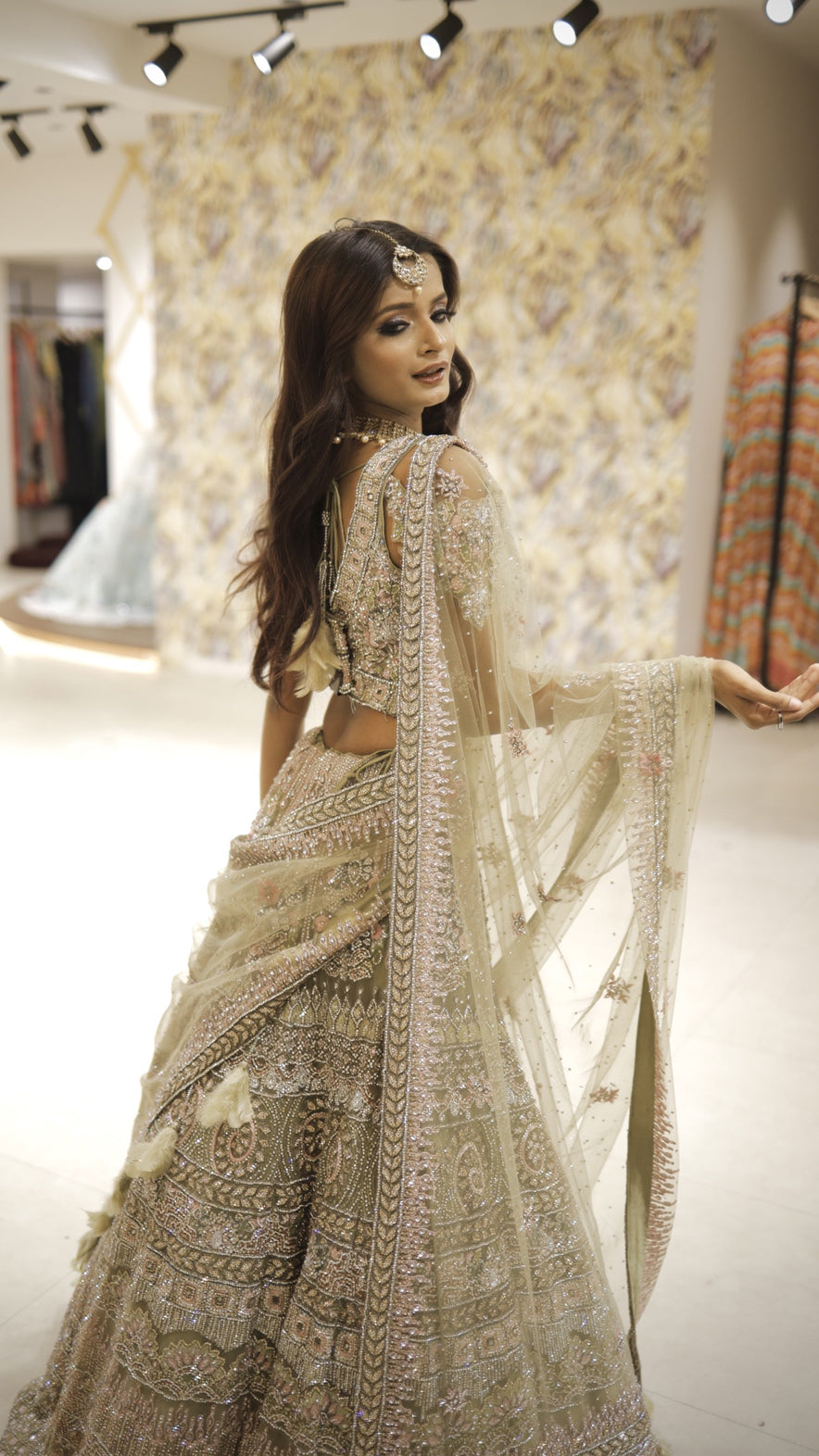 Pista green bridal lehenga in net with thread & crystal