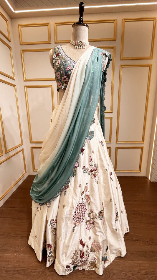 Cream & dusty turquoise drape lehenga with thread & pearl in raw silk