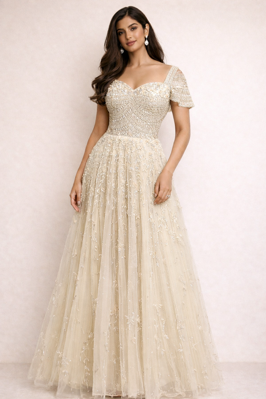 Ivory cream engagement gown with cut dana & pearl work on net