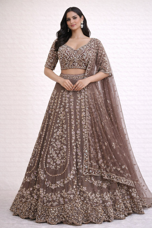 Mauve organza lehenga with zarkan & pearl work along with heavy four side border dupatta