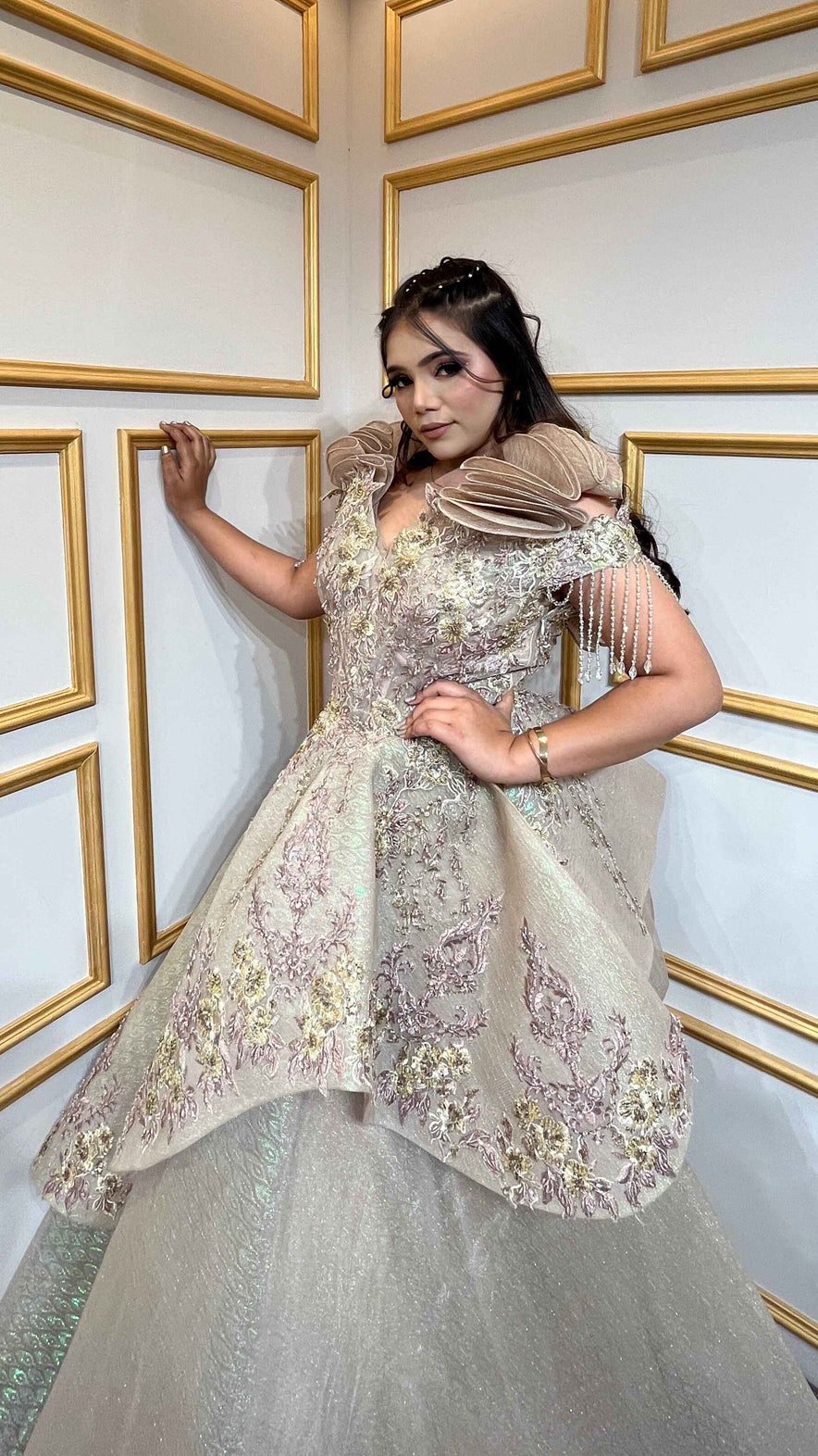 Russian self tissue engagement gown with resham & zardozi hand touch in golden
