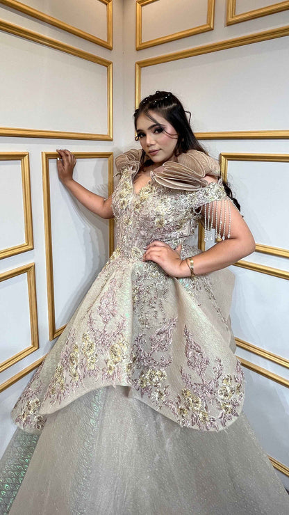 Russian self tissue engagement gown with resham & zardozi hand touch in golden