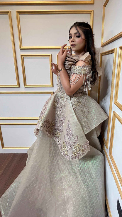 Russian self tissue engagement gown with resham & zardozi hand touch in golden