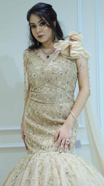 Golden cream mermaid gown with pearl & tube in net