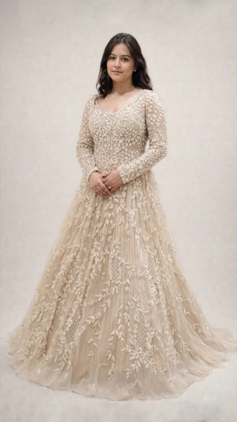 Champagne gold engagement gown with sequins & zarkan work on net