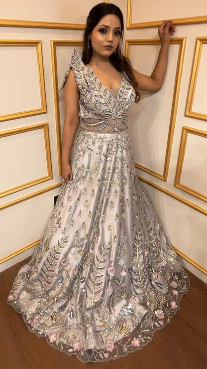 Ice blue engagement gown in net with pearl & cut dana