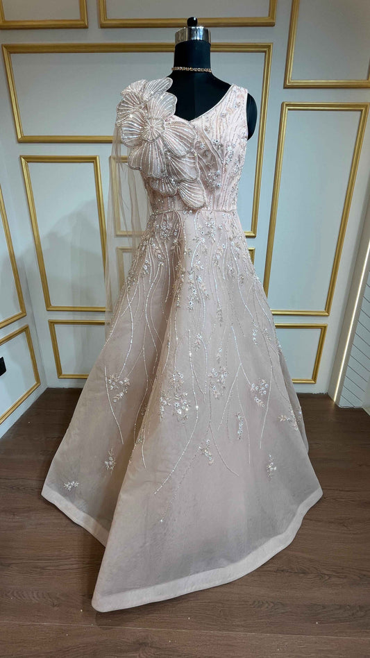Crystal & pearl work on mesh gown in powder peach color