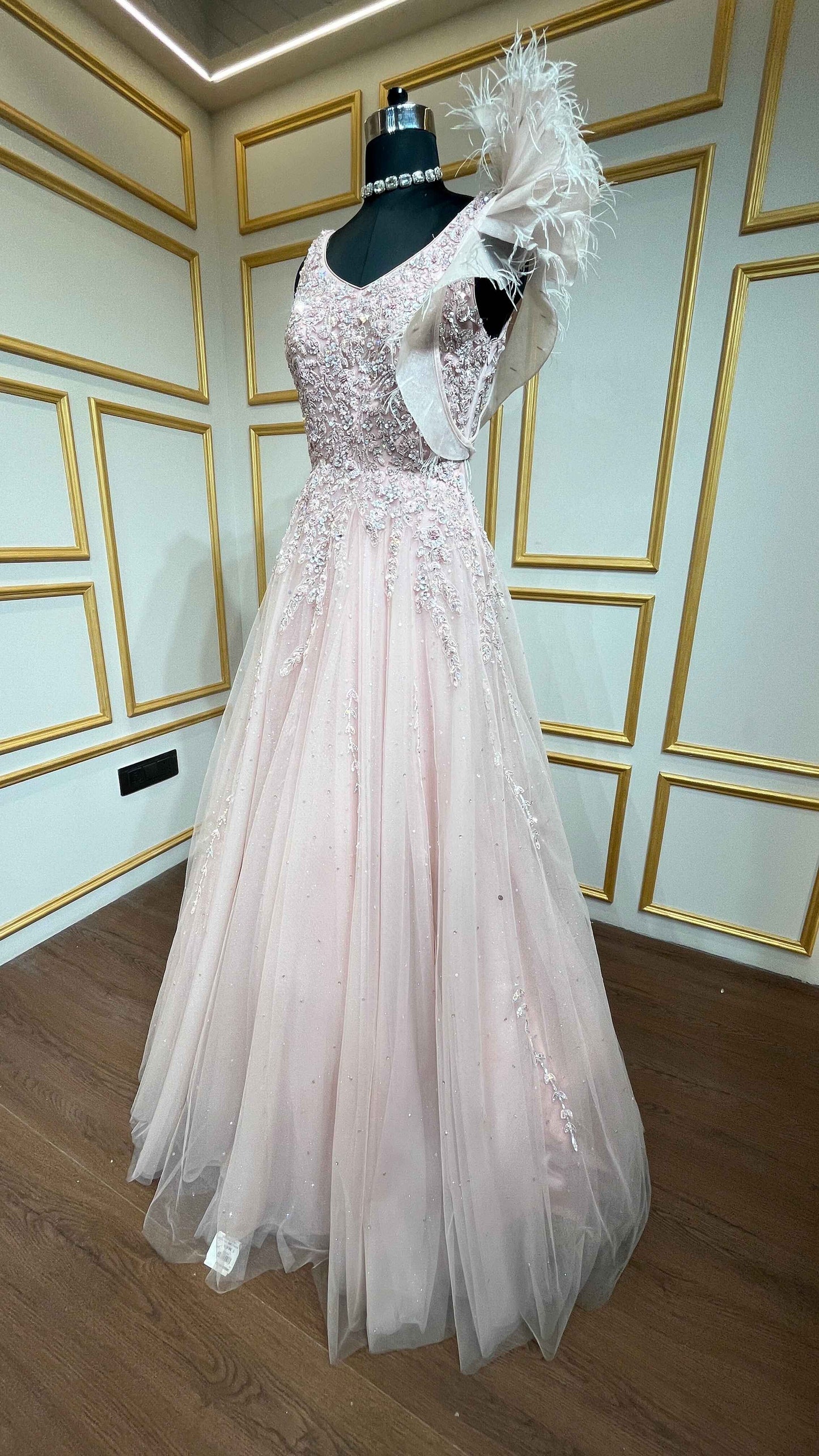 Peach engagement gown with pearl & crystal in net
