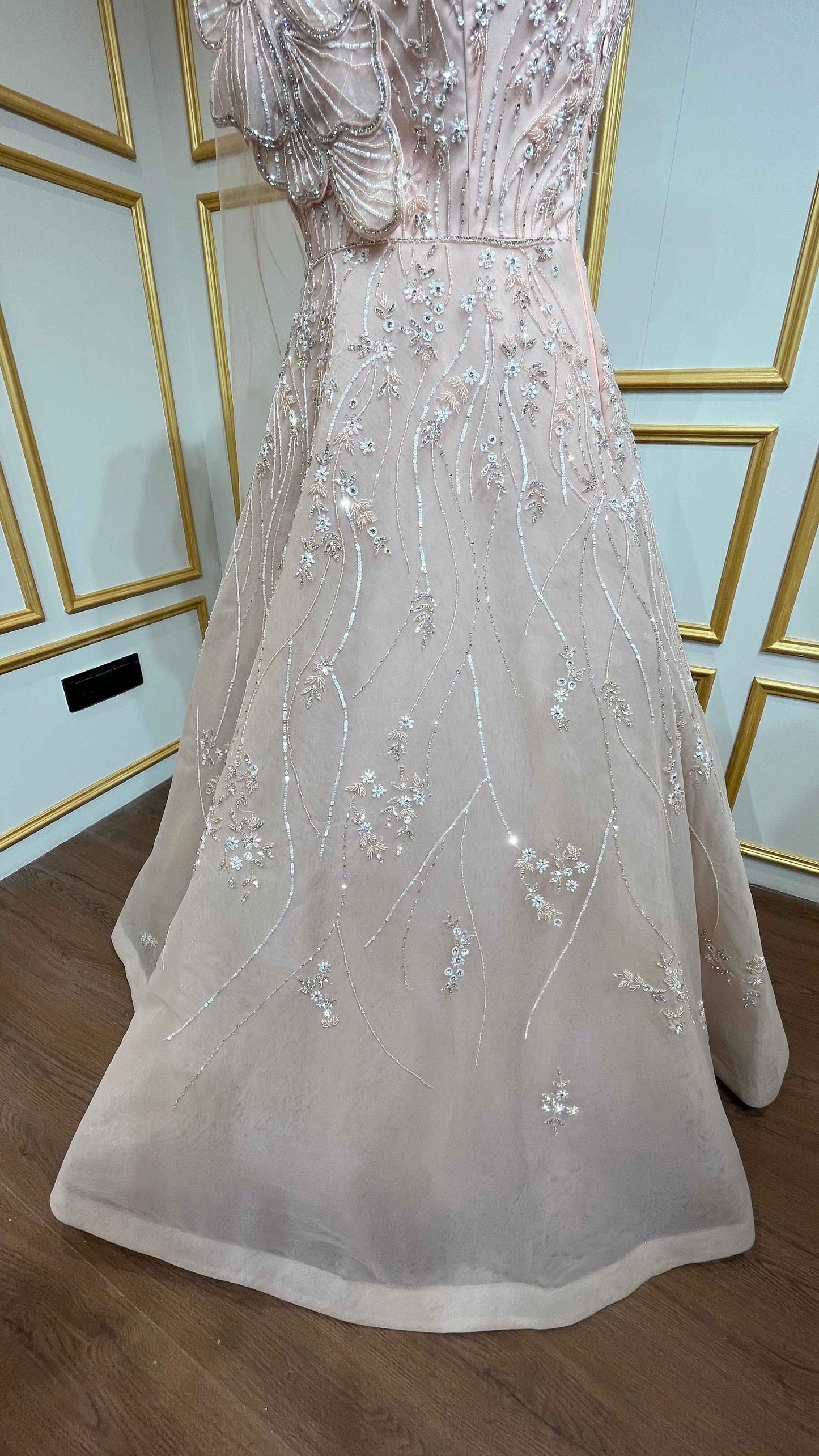 Crystal & pearl work on mesh gown in powder peach color