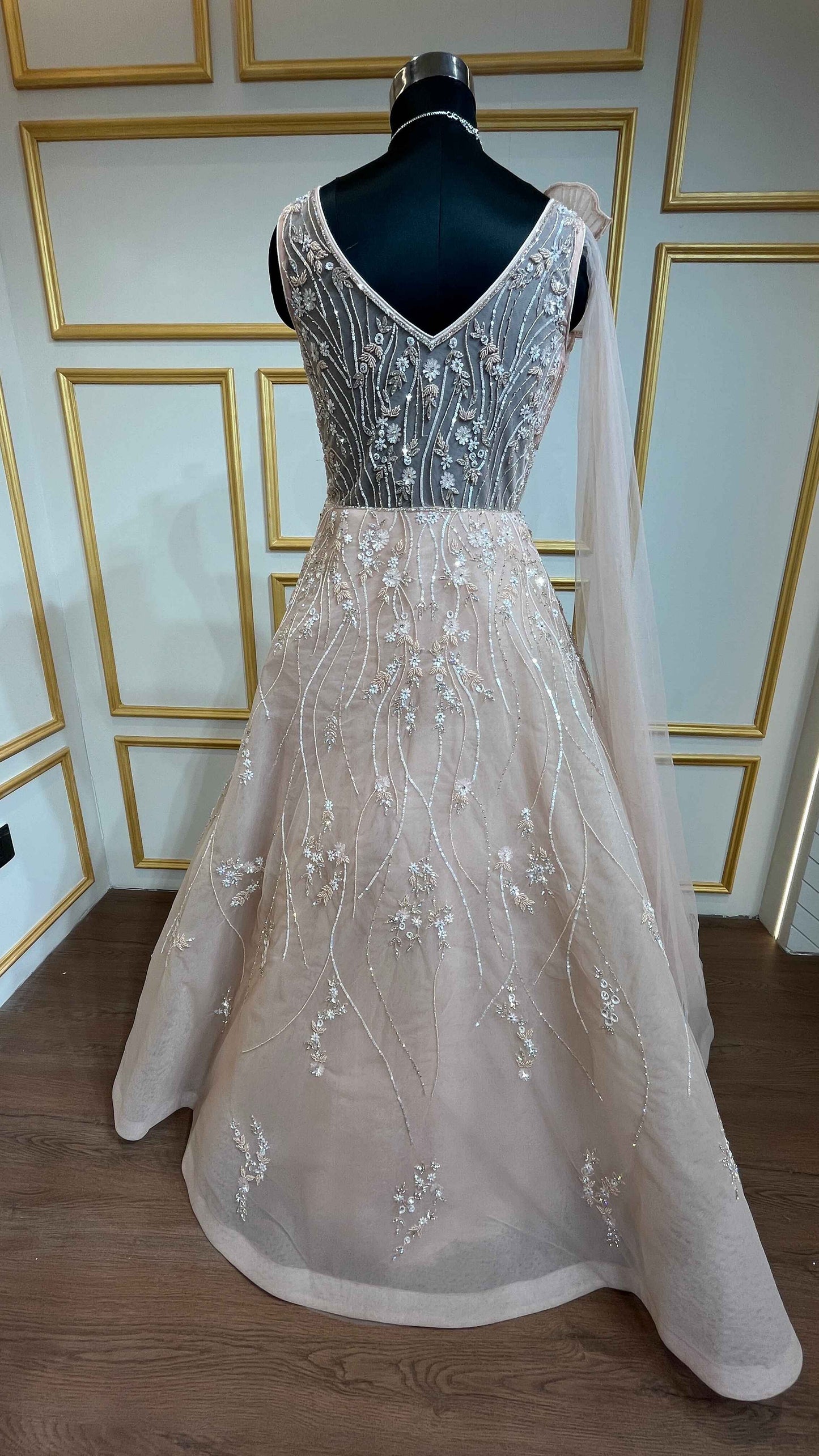 Crystal & pearl work on mesh gown in powder peach color