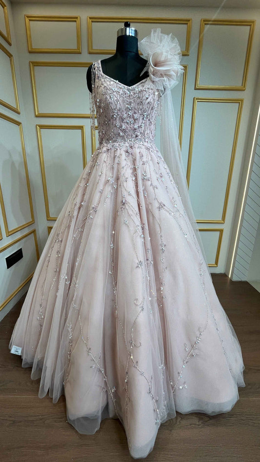 Pearl & crystal work on Light peach ball gown in net